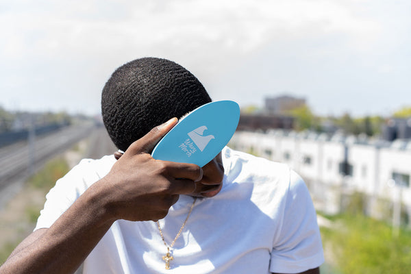 a waver brushing their 360 waves