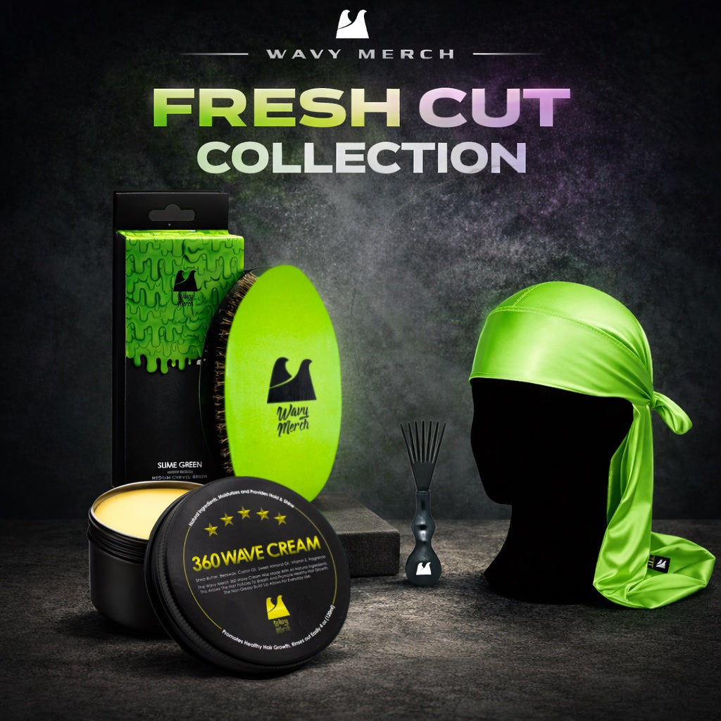 Wavy Merch Fresh Cut Collection with hair care products on a dark background