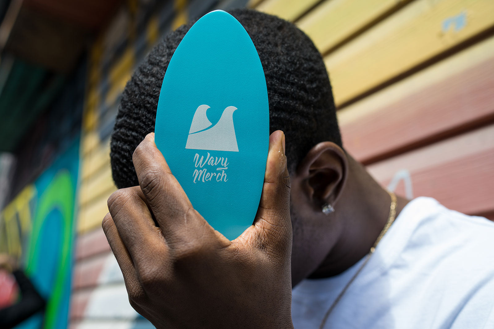 a waver using the alaska ice medium wave brush on their 360 waves